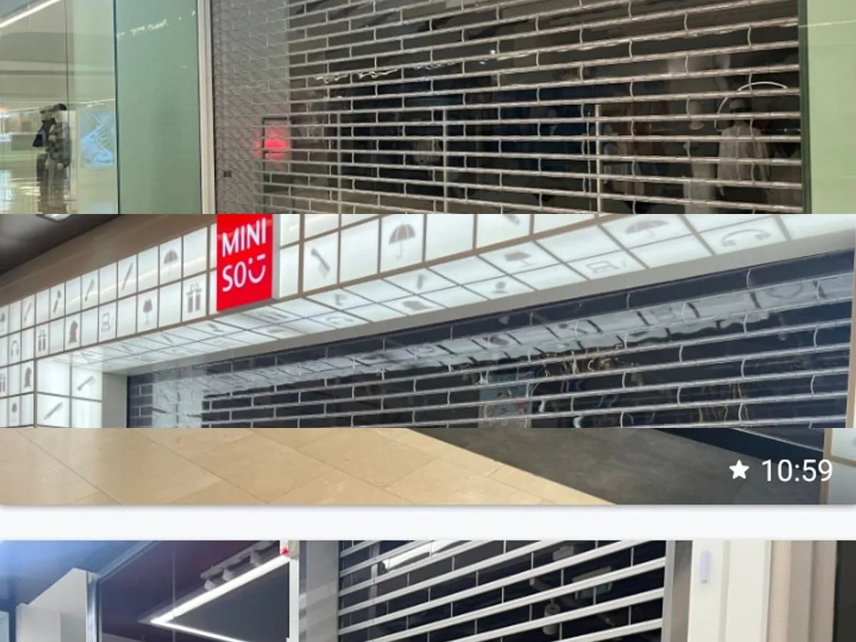 Montage de grilles et rideaux métalliques de boutiques en centre commercial — fermetures ajourées